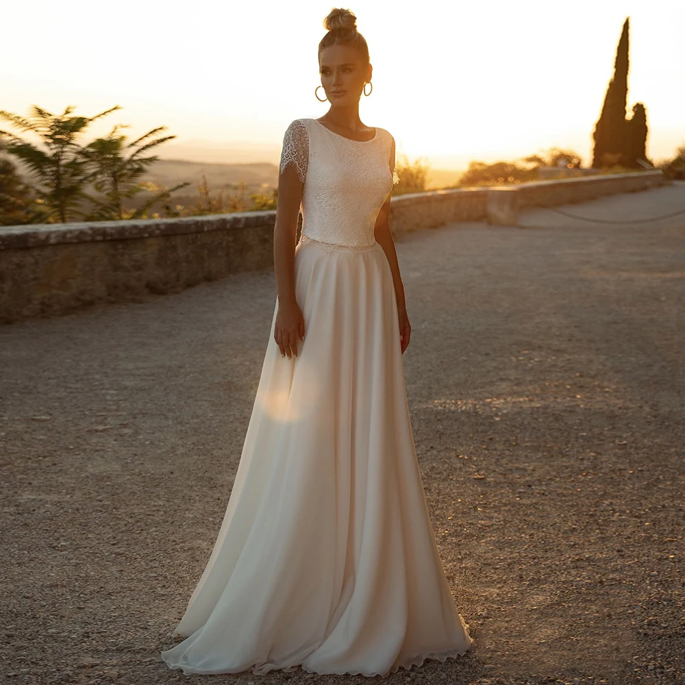 Abito da sposa elegante a maniche corte in chiffon a trapezio personalizzato per le spose 2023 Abiti da sposa classici in pizzo con o-collo e bottoni sul retro Vestid