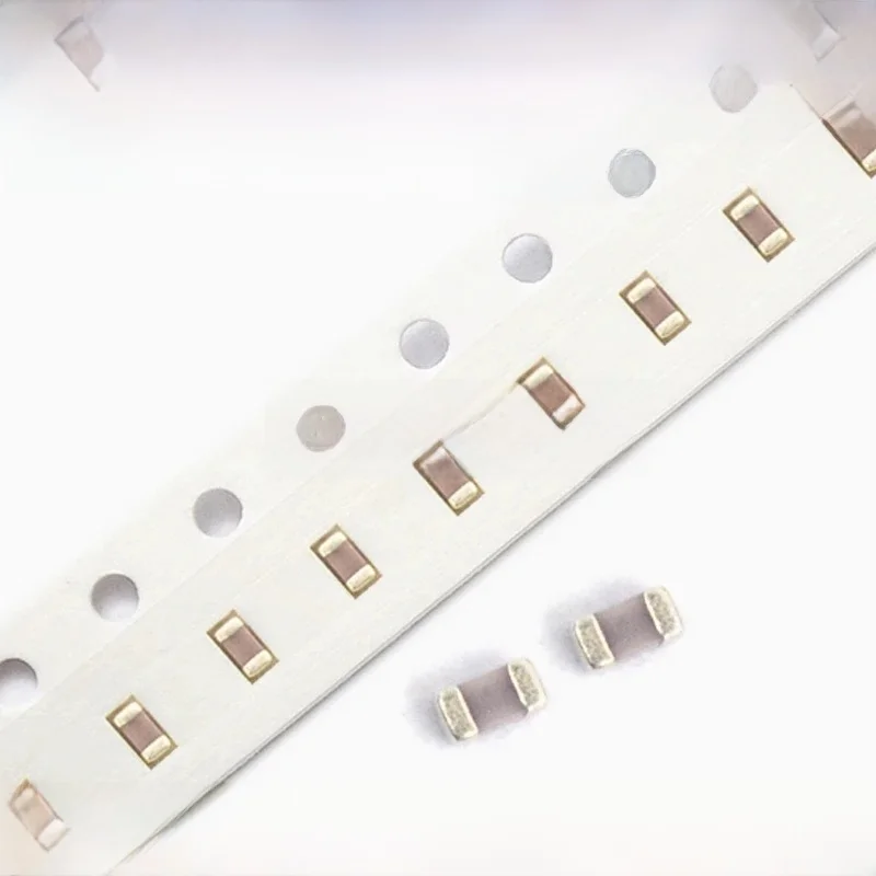100 sztuk / partia Kondensator SMD 50V 0201 0402 0805 0603 1pF 3.5pF 6.8pF 82pF 100pF 1nF 10nF 1uF 10uF 100nF 220pF 470pF 22nF 220nF — zdjęcie 2