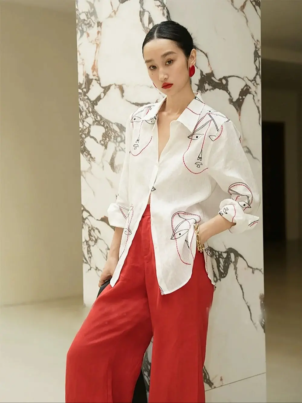 

Elegant minimalist women's finely embroidered linen pants suit