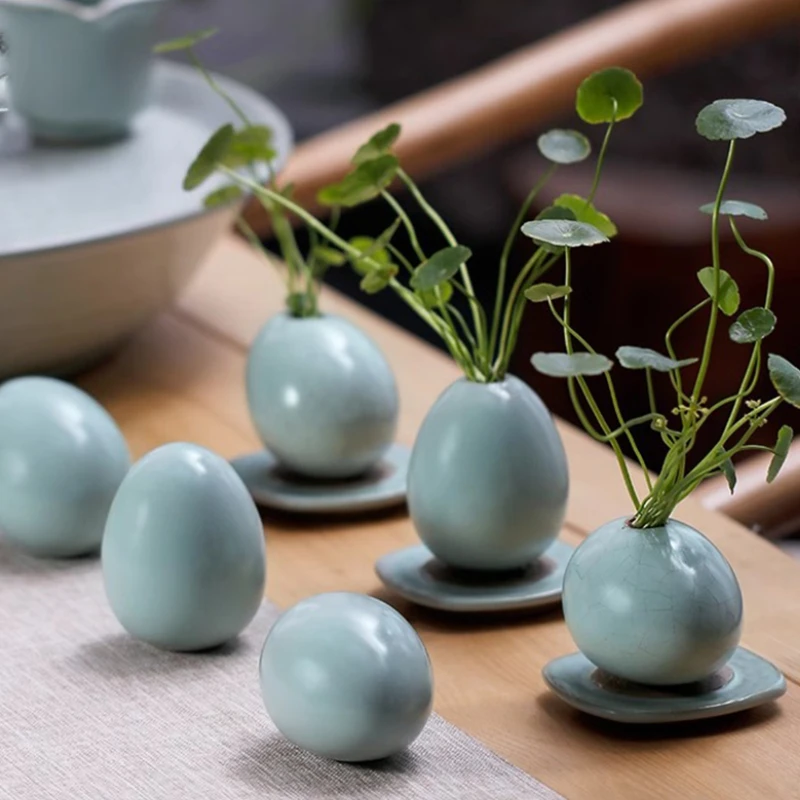 

Egg-shaped desktop hydroponic plant mini vase Nordic ceramic vase office home decoration aromatherapy empty bottle New Year gift