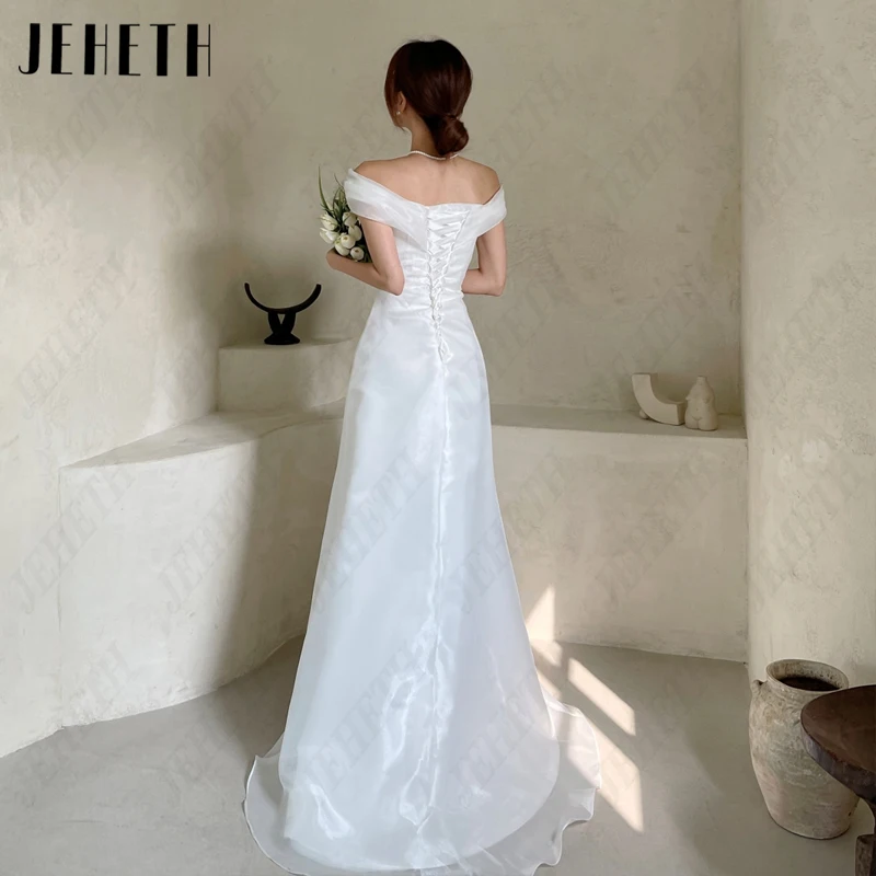 JEHETH Boat Neck Vestidos de casamento Mulheres Organza Pleat Bridal Gowns A-Line Backless Fotografia Vintage Sleeveless High/Low Boat Neck Vestidos de casamento Mulheres Organza Pleat Bridal Gowns A-Line Backless Foto