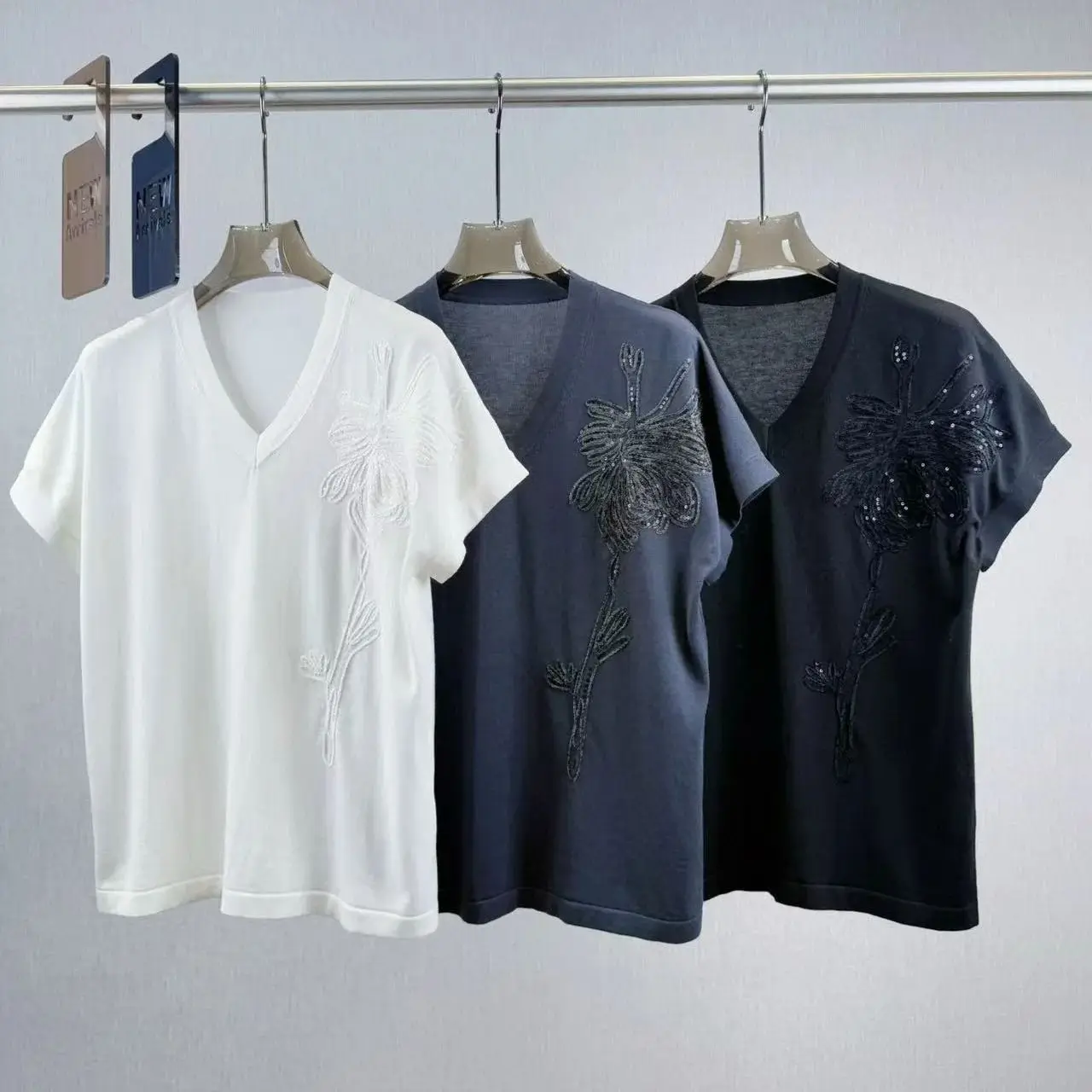 

Finely embroidered solid color short sleeved blouse