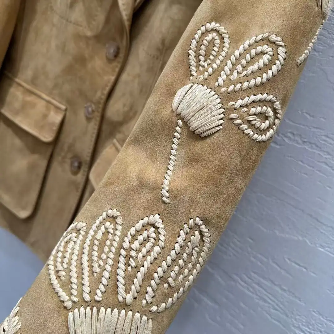 Hoogwaardig leren jack met handhaakborduurwerk