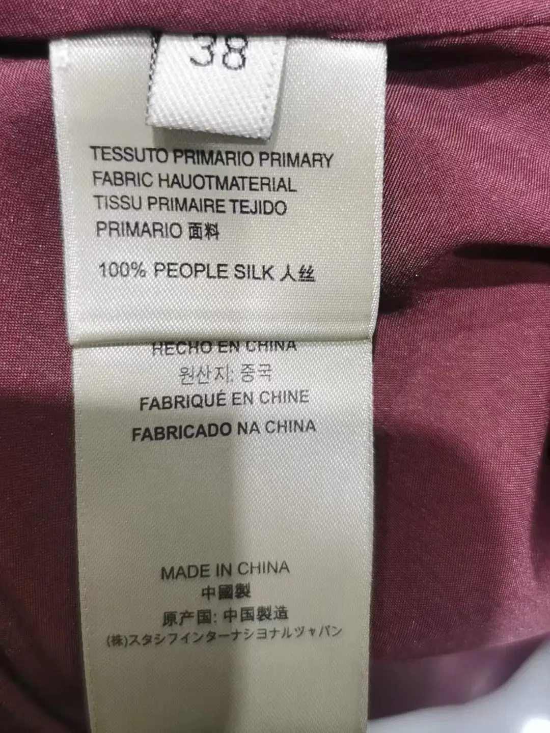 ชุดเดรสสไตล์เสื้อเชิ้ตที่หรูหราพร้อมแขนยาวและดีไซน์กระเป๋า