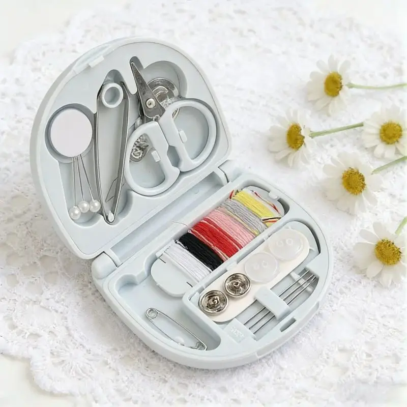 

All-in-One Blue Sewing Box with Complete Accessories​ – Measuring Tape, Buttons, Snaps, Pincushion, Handy for Clothing Fixes.