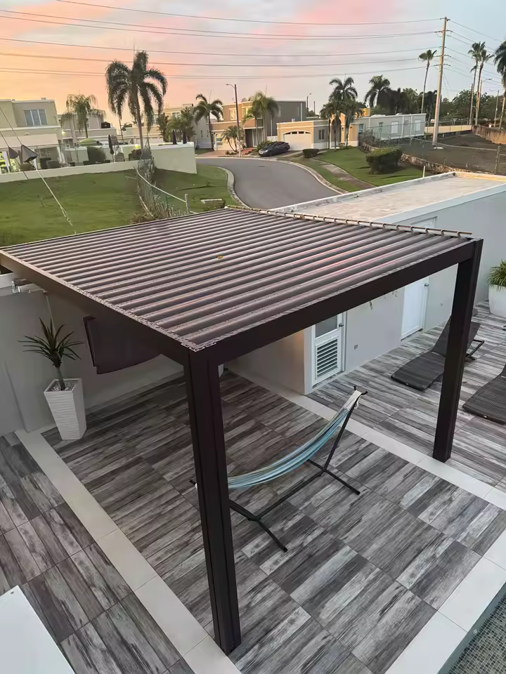 Motorized roof louver mechanism details under pergola shelter