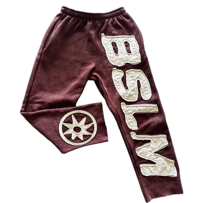 

featuring a unique street style, high street hip-hop, letter embroidery, and fashionable casual pants for men