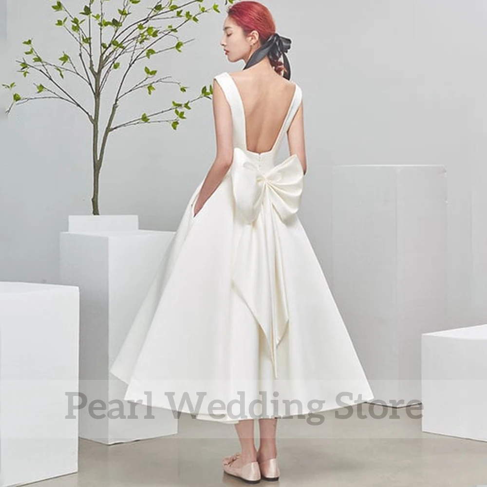 Simple Sleeveless Short Wedding Dress Square Collar A-Line Tea-Length Sexy Open Back with Pocket and Bow Bridal Register Gowns