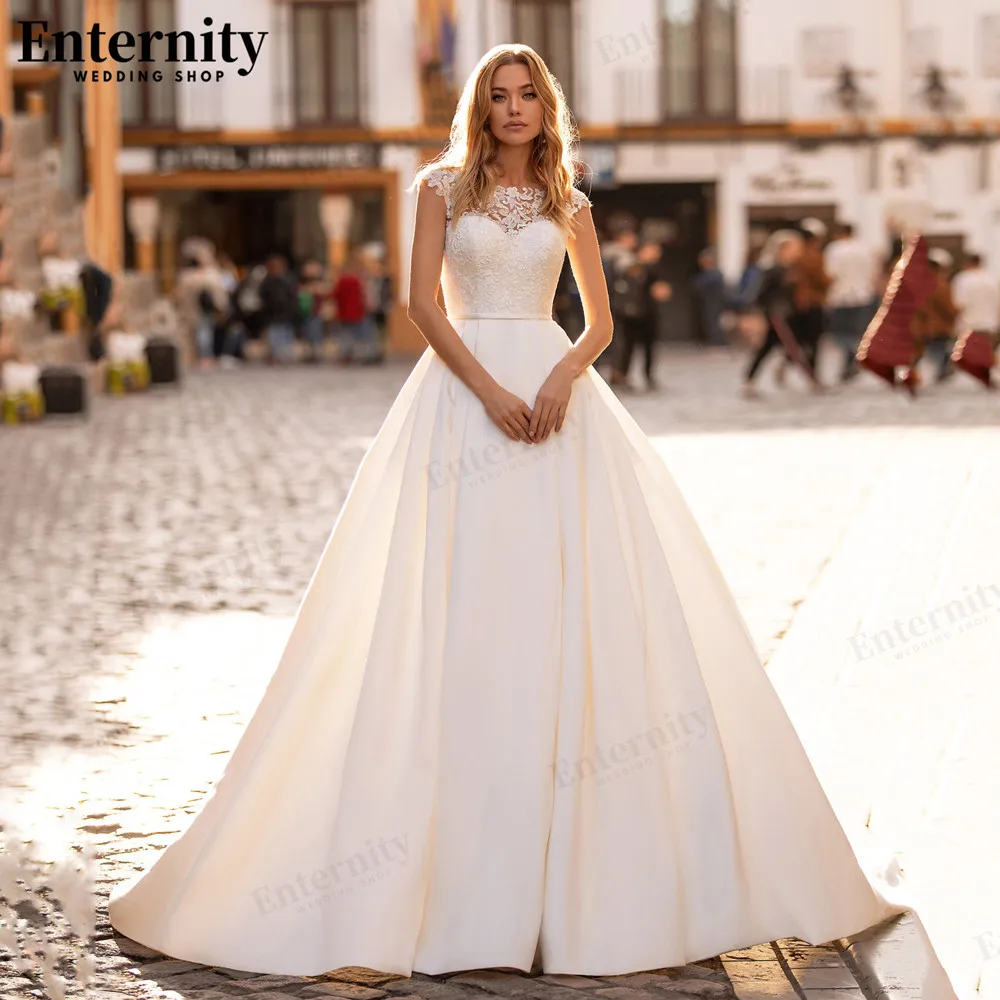 Vestido De Novia personalizado con cuello redondo y mangas casquillo, apliques De encaje hasta el suelo, vestido De Novia con botones y espalda descubierta