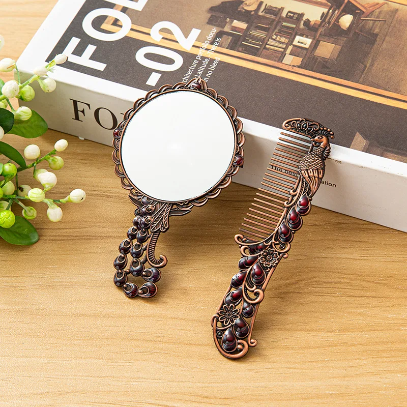 

Metal makeup mirror small mirror peacock mirror retro mirror portable handle mirror comb high-definition makeup mirror
