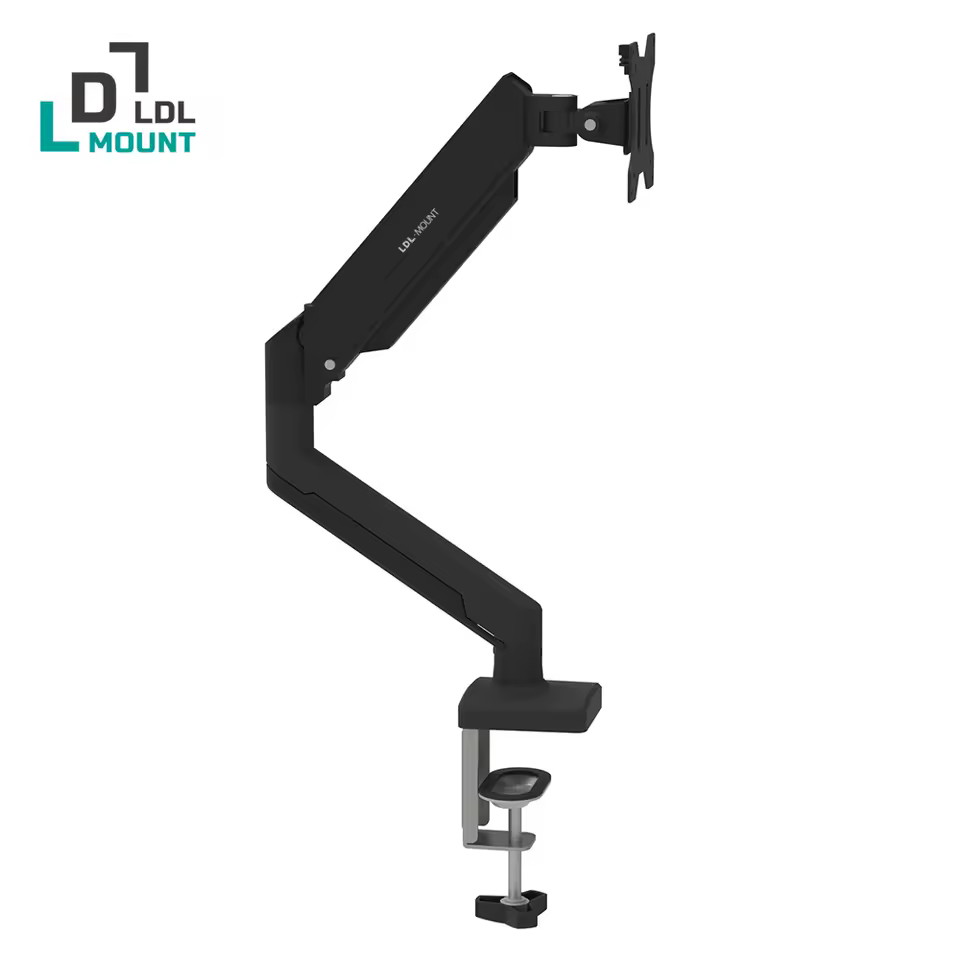 Single monitor arm mounted on a desk edge