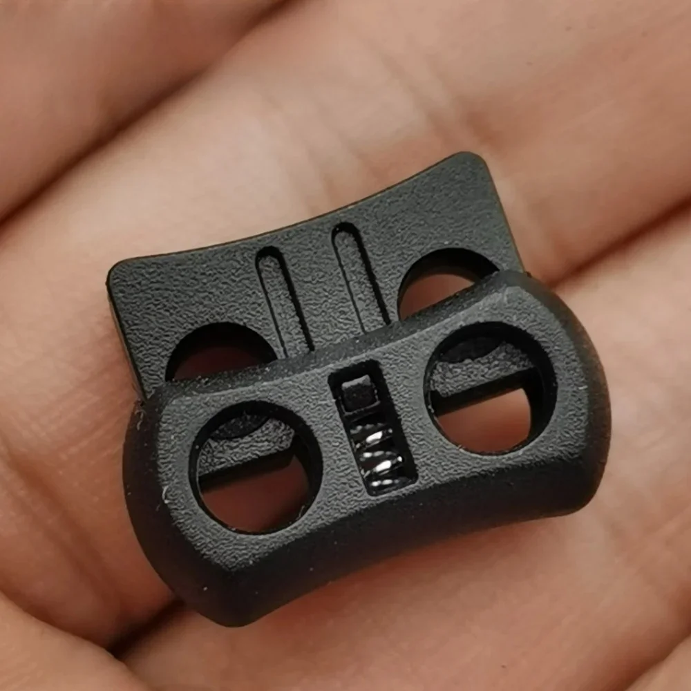 10 Stück/Packung 2-Loch-Kordelstopper aus Kunststoff, schwarz, 15 mm x 20 mm x 7,5 mm