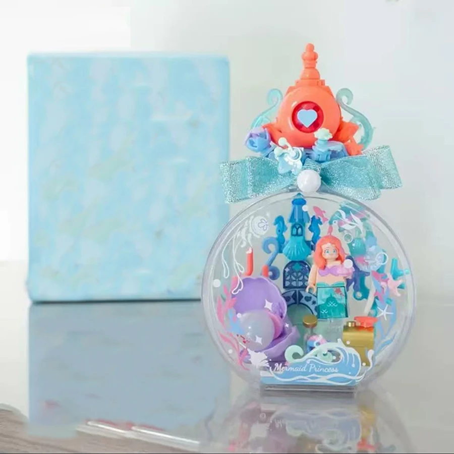 

Mermaid party with fairy tale building blocks in the bottle. Shell Pearl Little Girl building blocks. Gift.