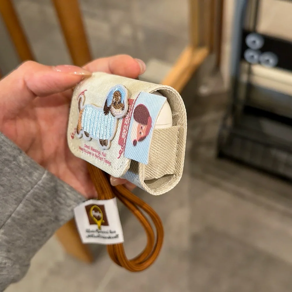 

Cute embroidered puppy earphone protective case, suitable for AirPods 4/3/2 Pro/2/4, with lanyard,INS shockproof protective case