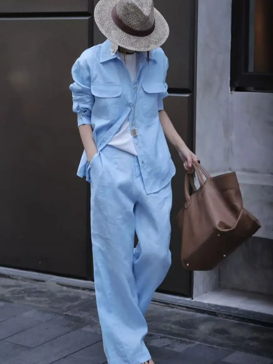 Terno de calças de linho puro feminino mínimo no início do outono