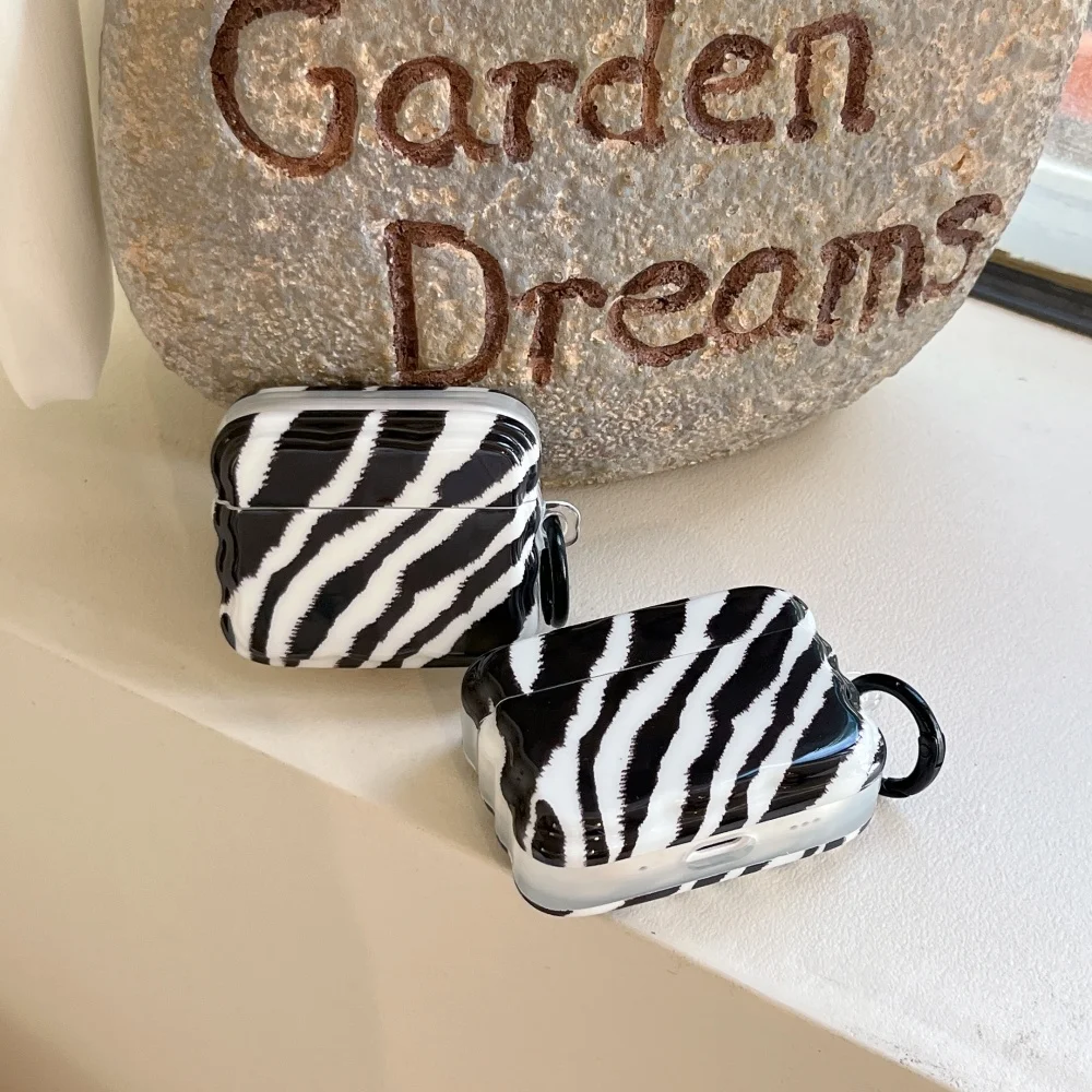 

Twisted edge, irregular diagonal strip earphone protective case,suitable for AirPods 4/3/Pro/2/3, new shockproof protective case