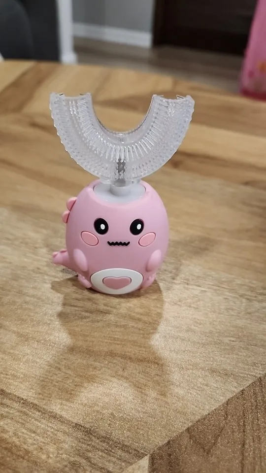 Elektrische Kinderzahnbürste in U-Form Foto-Test