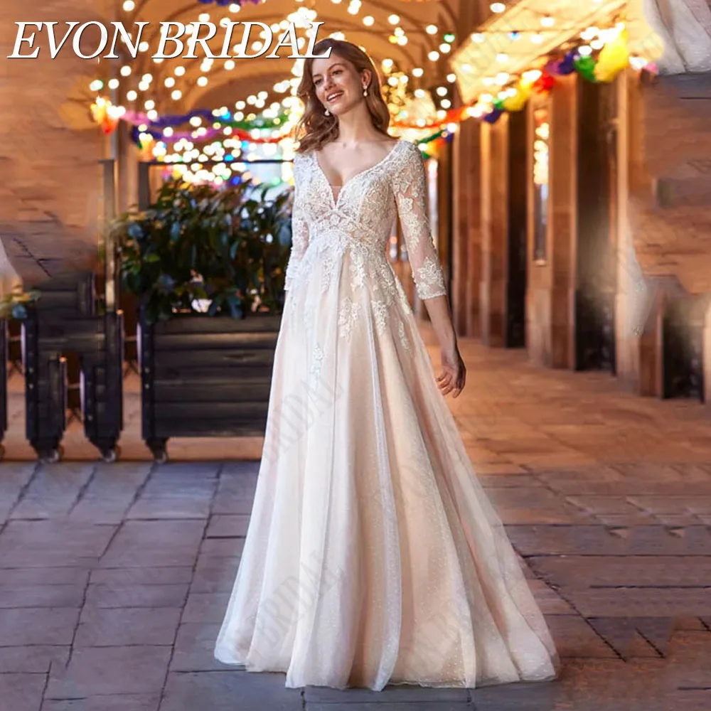 Evon Braut V-Ausschnitt plus Größe Brautkleider für Frau rücken frei Ärmel Applikation A-Linie Tüll Spitze Vestidos de NoviaEVON BRIDAL V-Ausschnitt Plus Größe Brautkleider Für Frau Rückenlos 3/4 Ärmel Applique A-Linie