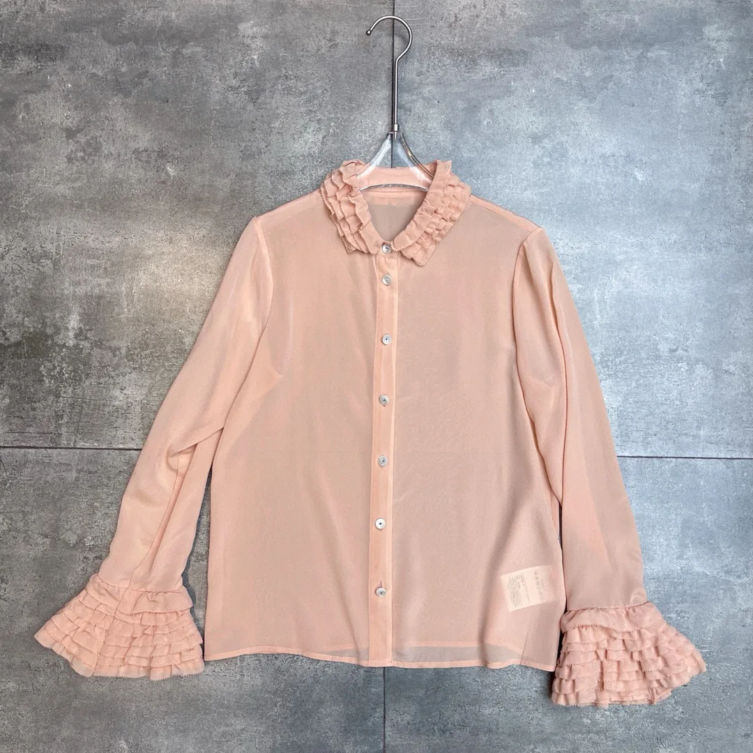 Elegant vrouwelijk overhemd met lange mouwen van 100% zijde