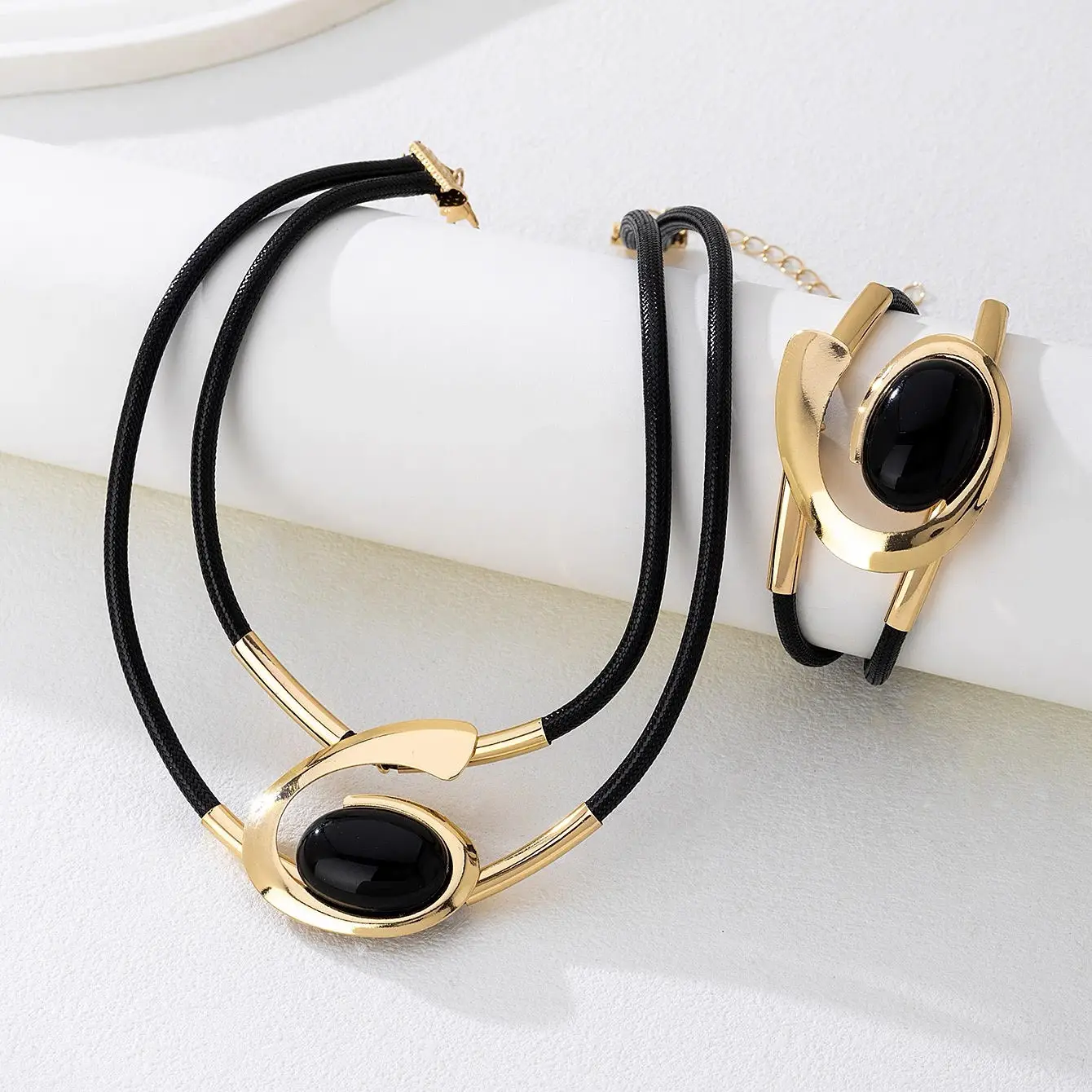 

Modern Black Onyx & Gold Statement Necklace & Bracelet Set