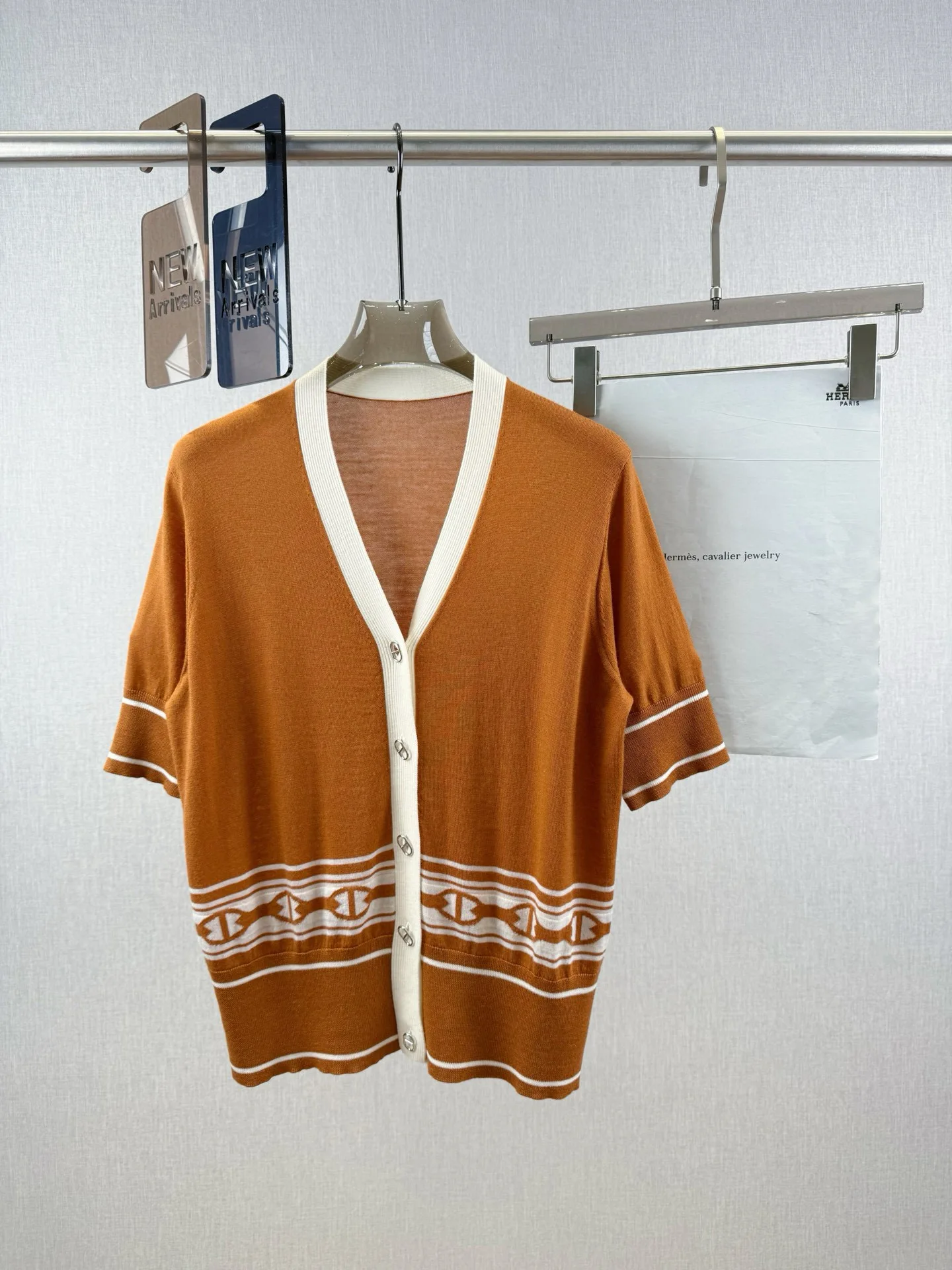 

Elegant women's v-neckline merino wool knitted blouse