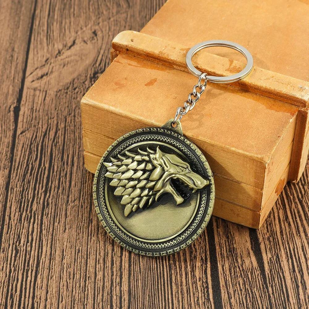 Game of Thrones hiver arrive maison Stark tête de loup Badge porte-clés pendentif glace et feu porte-clés Llaveros de cadeaux de film
