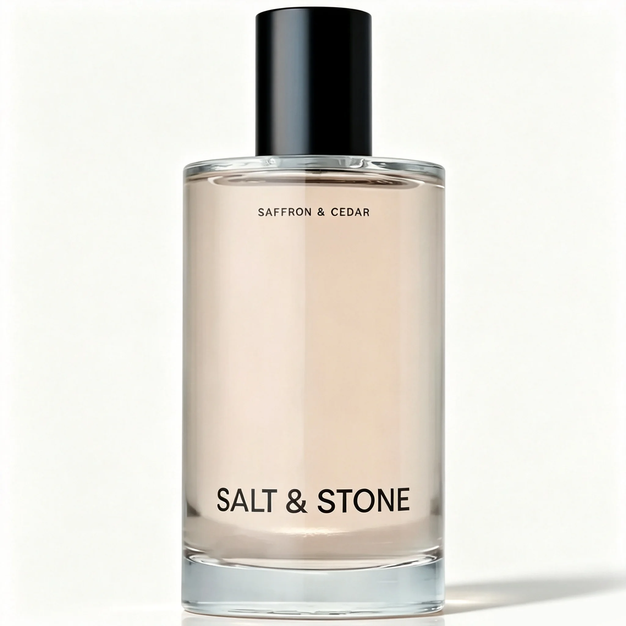 Perfume Unisex de Azafrán y Cedro de Larga Duración: Salt & Stone, Aroma Cálido Amaderado Especiado, Botella de Vidrio Transparente Alta con Tapa Negra Mate, Fragancia Minimalista para Hombres y Mujeres, 100 ml