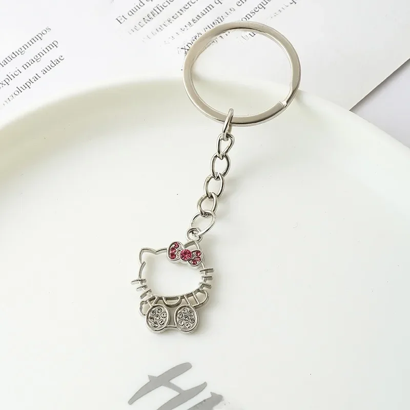 Porte-clés dessin animé Sanrio Hello Kitty, figurine creuse KT chat, Badge en métal, pendentif, bijoux Kawaii, accessoires cadeaux