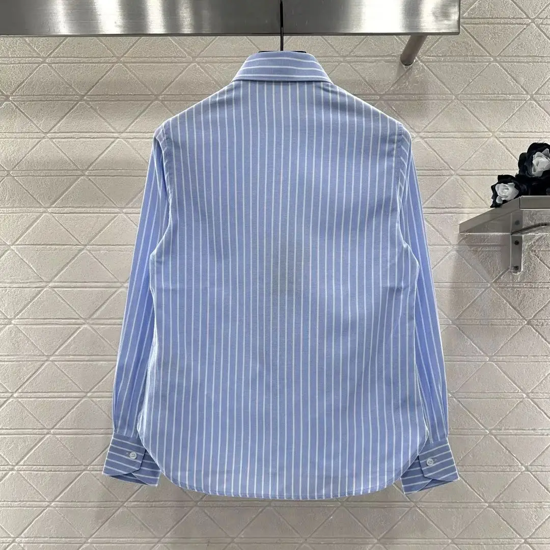 

2025 autumn and winter women's clothing fashionable striped long sleeve lapel shirt cotton material fresh color scheme
