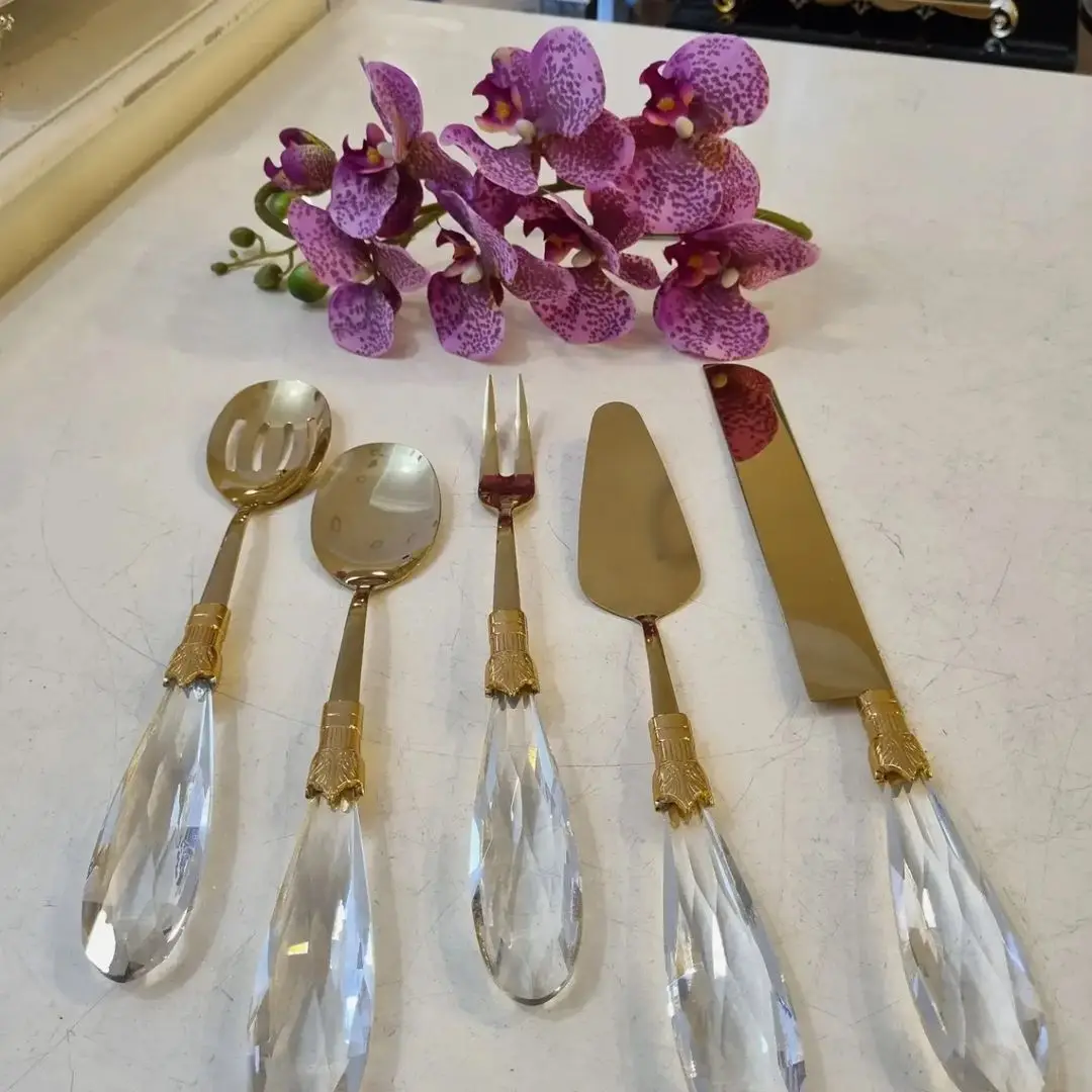 

Indulge in Opulence and Refinement: Elevate Your Home's Splendor with the Luxurious 5-Piece Gold Cake Knife, Spatula, Serving Fork, and Spoon Set for Stylish and Exquisite Dining Experiences