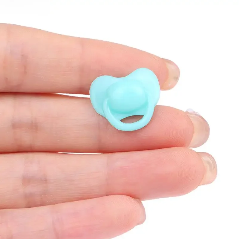 20 szt. Miniaturowa lalka pacyfikator smoczek akcesoria zabawkowe plastikowe zabawki zabawkowe lalka dla dzieci domu losowy kolor — zdjęcie 2