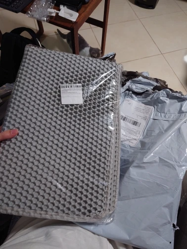 Customer review photo for Honeycomb Cat Litter Mat