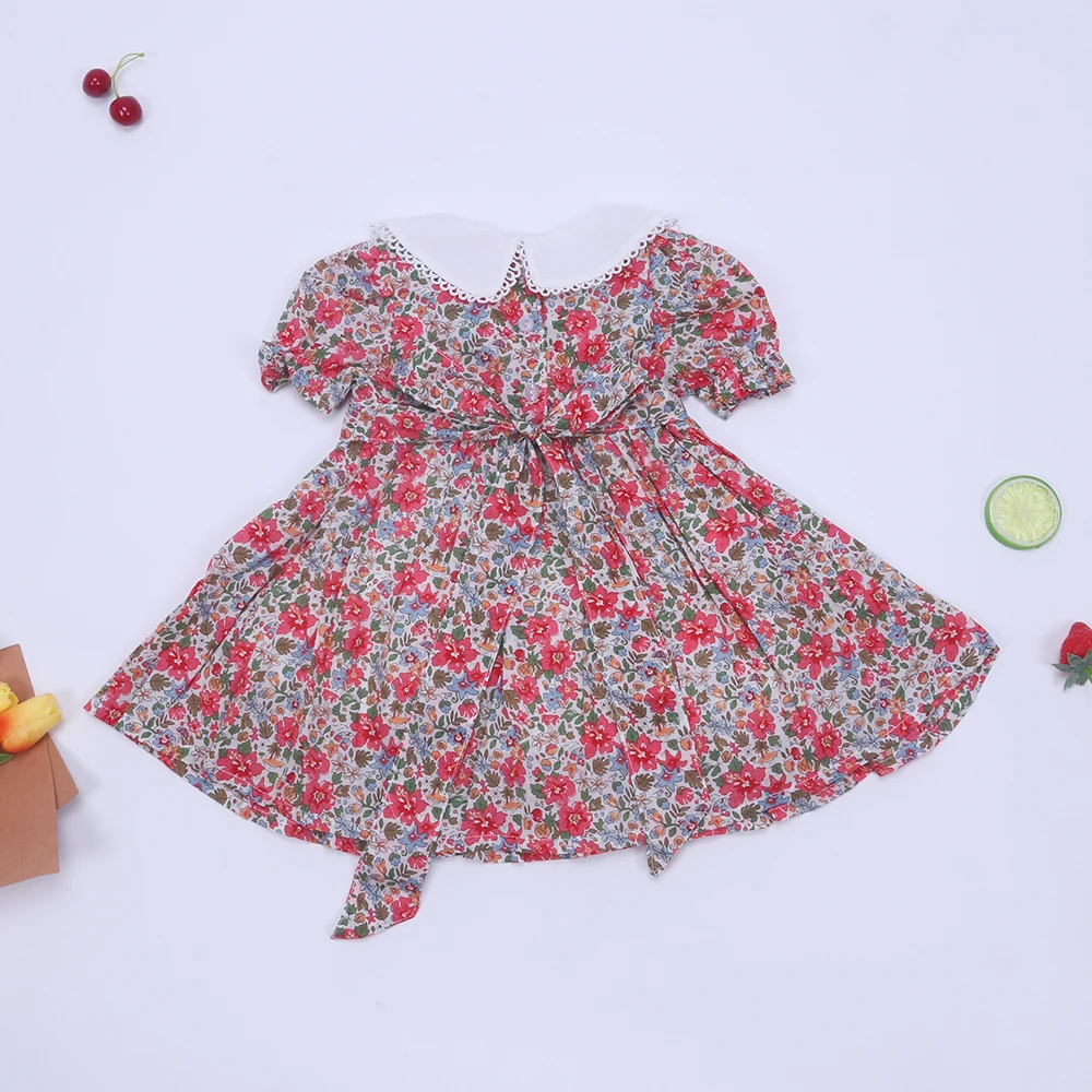 2024 Hand Smock Exquisite Summer Cotton Red Flower Short Sleeved White Doll Lape Neck Dress Girl Skirt Bow Binding Clothes