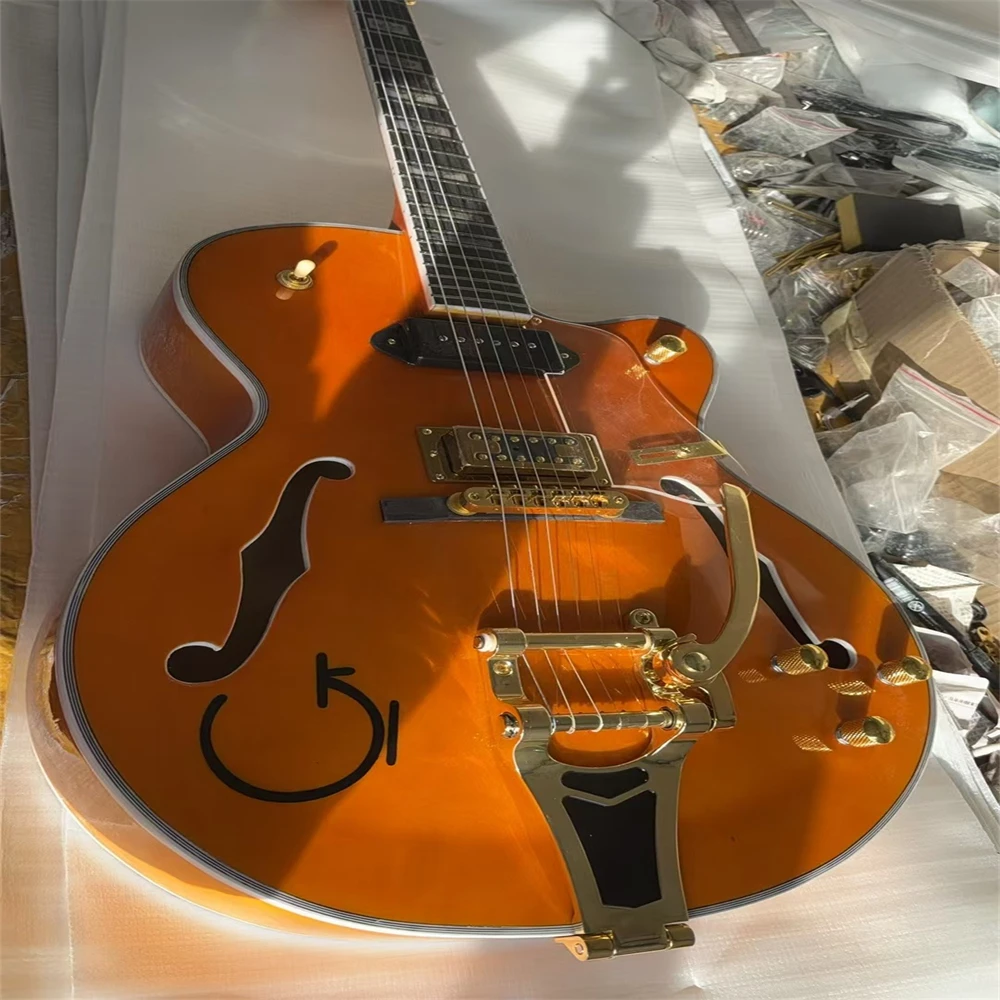 

Factory semi-hollow 6-string electric guitar gold hardware