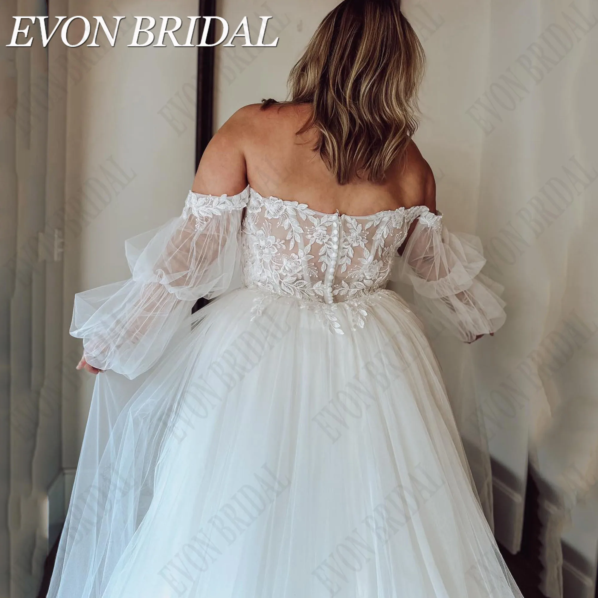 EVON เจ้าสาว Strapless ชุดแต่งงานลูกไม้ PLUS ขนาดสําหรับเจ้าสาวพัฟแขน A-Line Backless Applique ที่กําหนดเองชุดเจ้าสาว