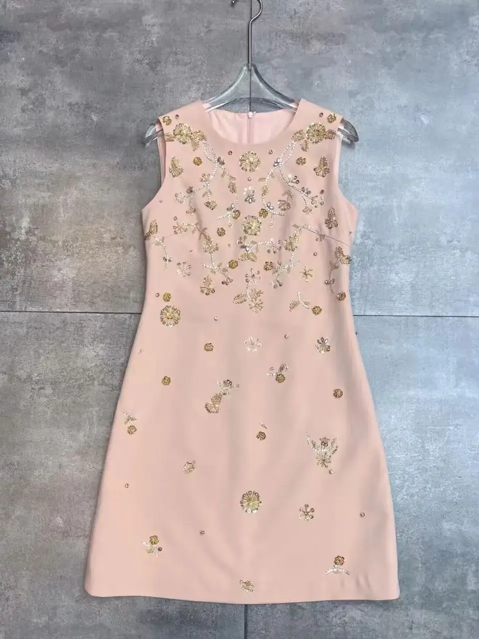 

Elegant exquisitely trimmed solid color figure flattering mini dress