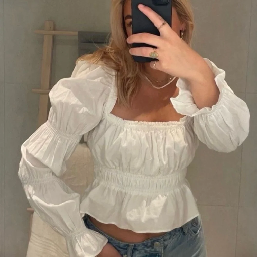 

Women Trendy Vacation Top Square Collar Pleated Bubble Sleeve Blouse Fashion 2026 Spring Summer Party Date Lady Blouse 0 sold