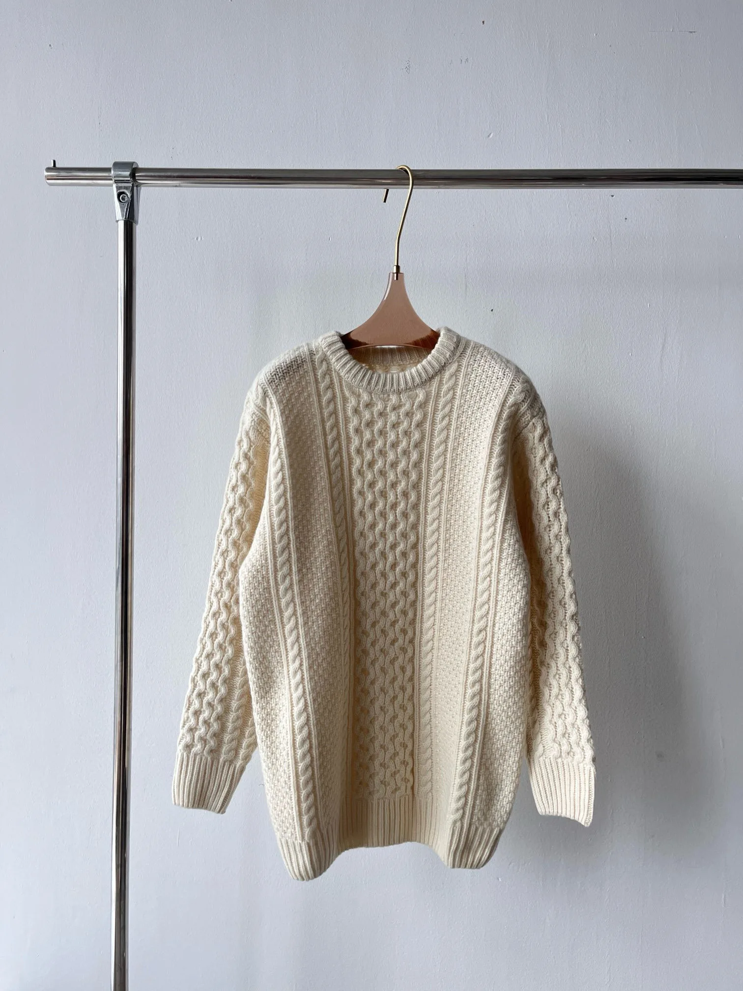 Exquisitely trimmed classic wool sweater of high quality