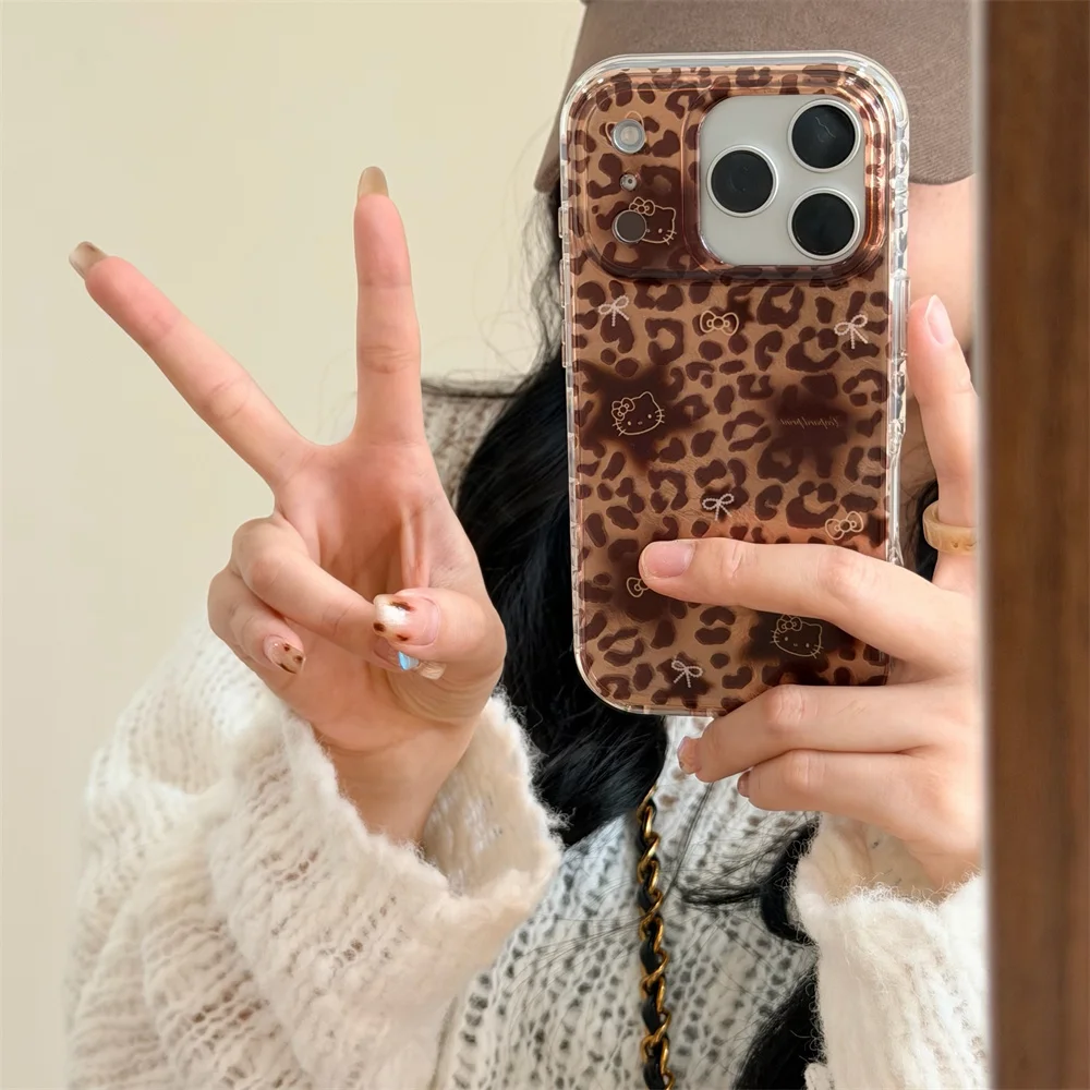 

New leopard print heart-shaped round edged HelloKitty phone case with lanyard, suitable for iPhone 17 Pro Max 14 15 16 13 Pro Ma