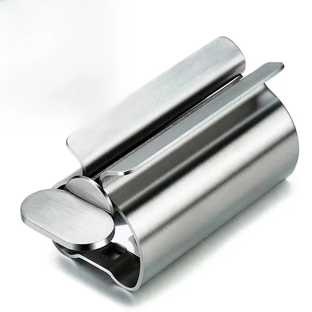 Accessoires de salle de bains, rouleau de Tube de presse-dentifrice, rouleau d'écriture en acier inoxydable, distributeur rotatif pour pommade et cosmétiques