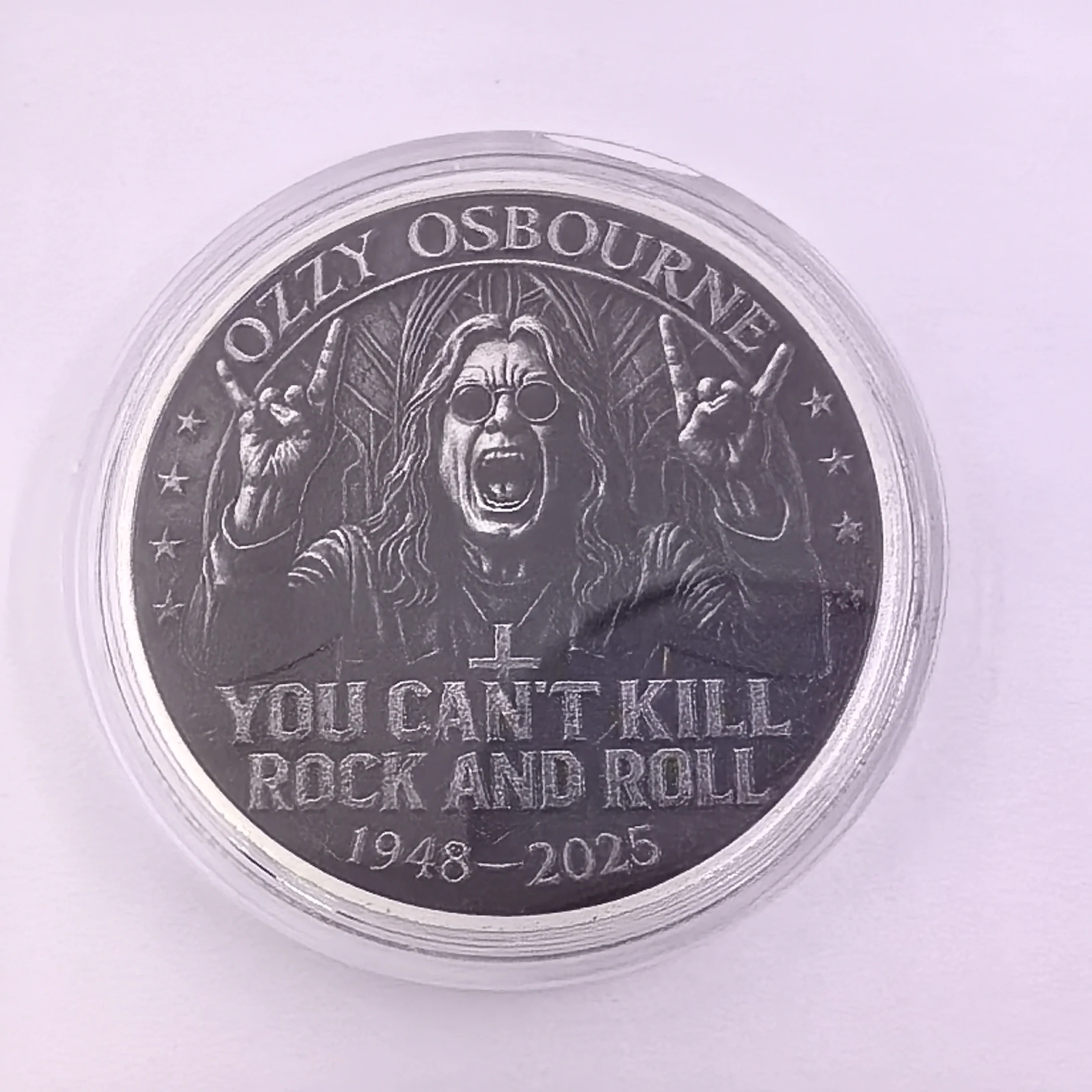 UK Rock singer Dark Sabbath gives farewell coin Commemorative gold and silver coins collection to fans as birthday gift