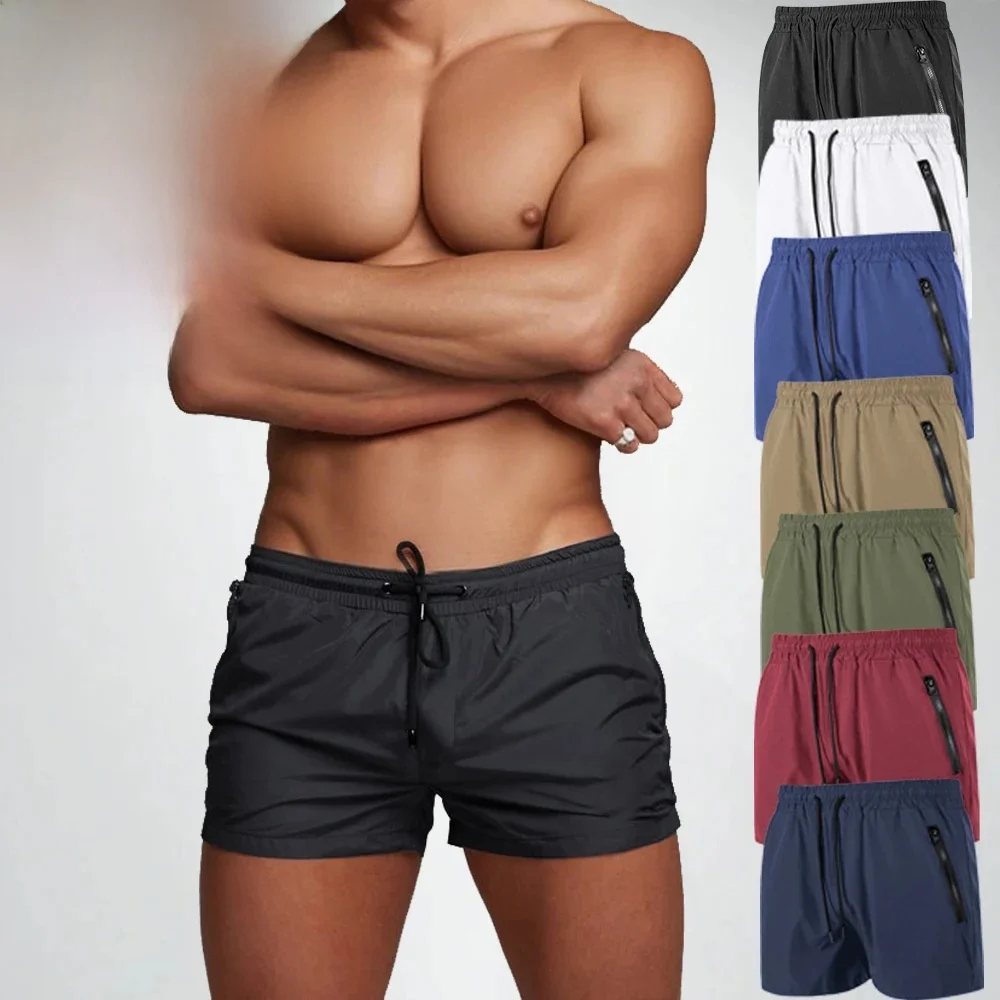 Męskie spodenki do biegania treningowego Sznurek z siateczkową podszewką Kieszeń na zamek błyskawiczny Jednolity kolor Sport Fitness na świeżym powietrzu Podstawowy Casual — zdjęcie 2