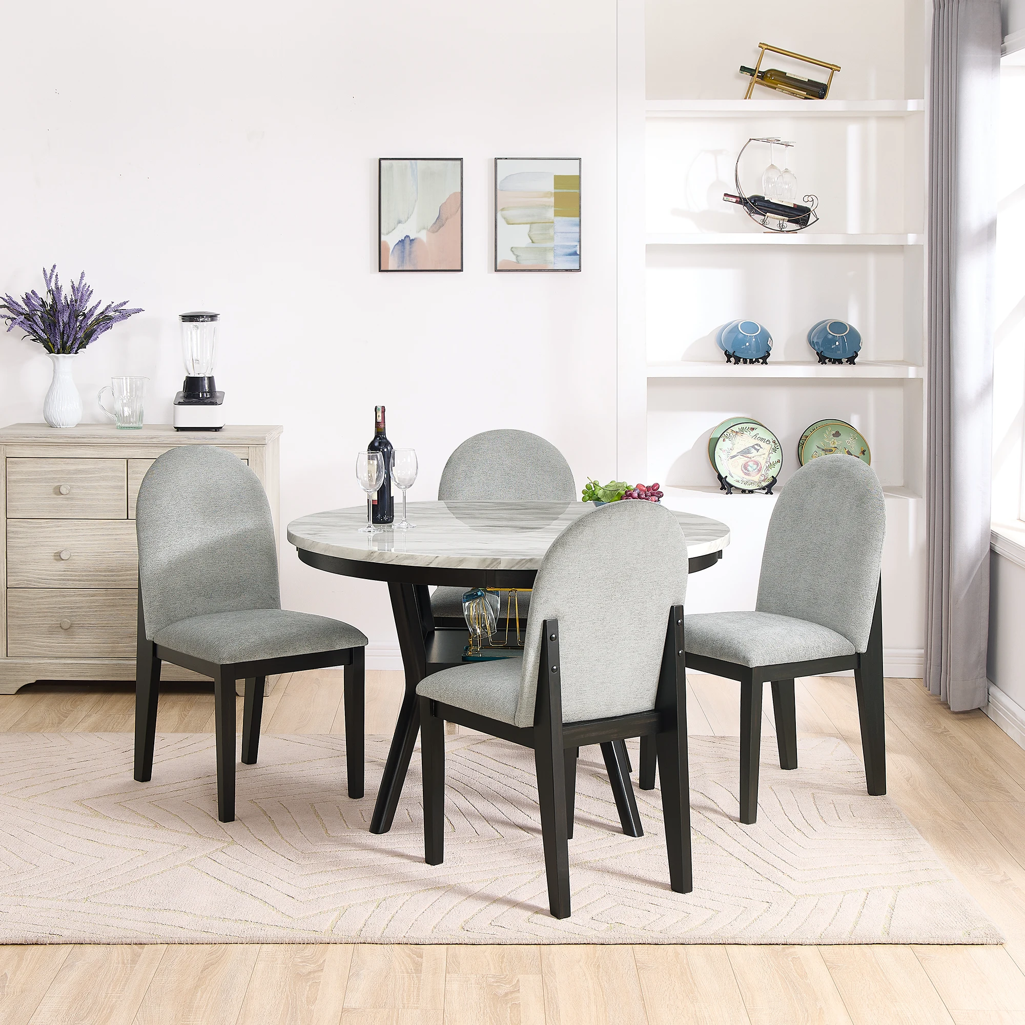 This 5-piece dining table and chair set, a round dining table with 4 cushioned chairs and a storage cabinet, improves the qualit