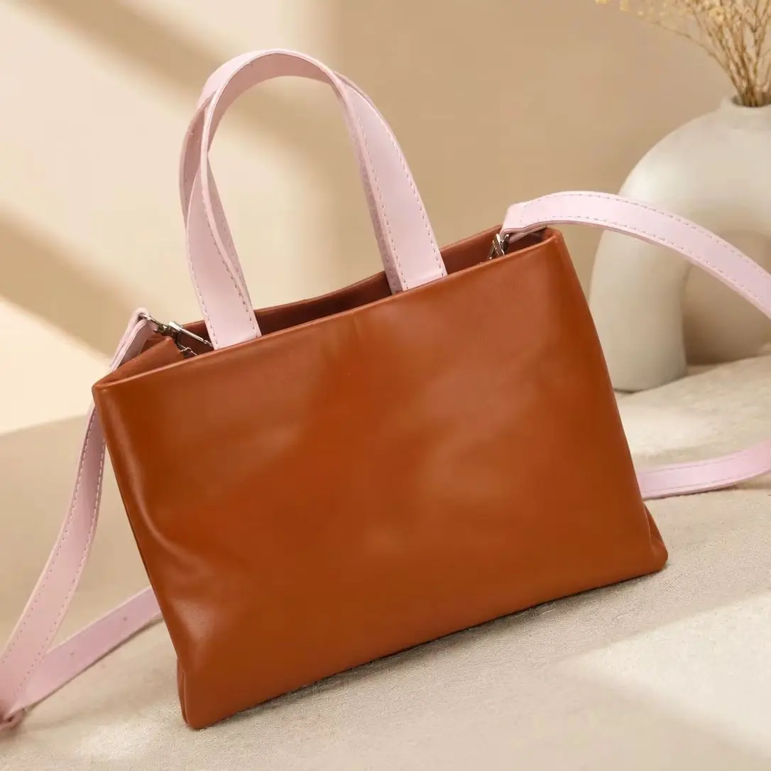 2026 New Luxury Bag Cow Leather Fabric Lining Shopper Medium Handbag down details 25x19x11cm