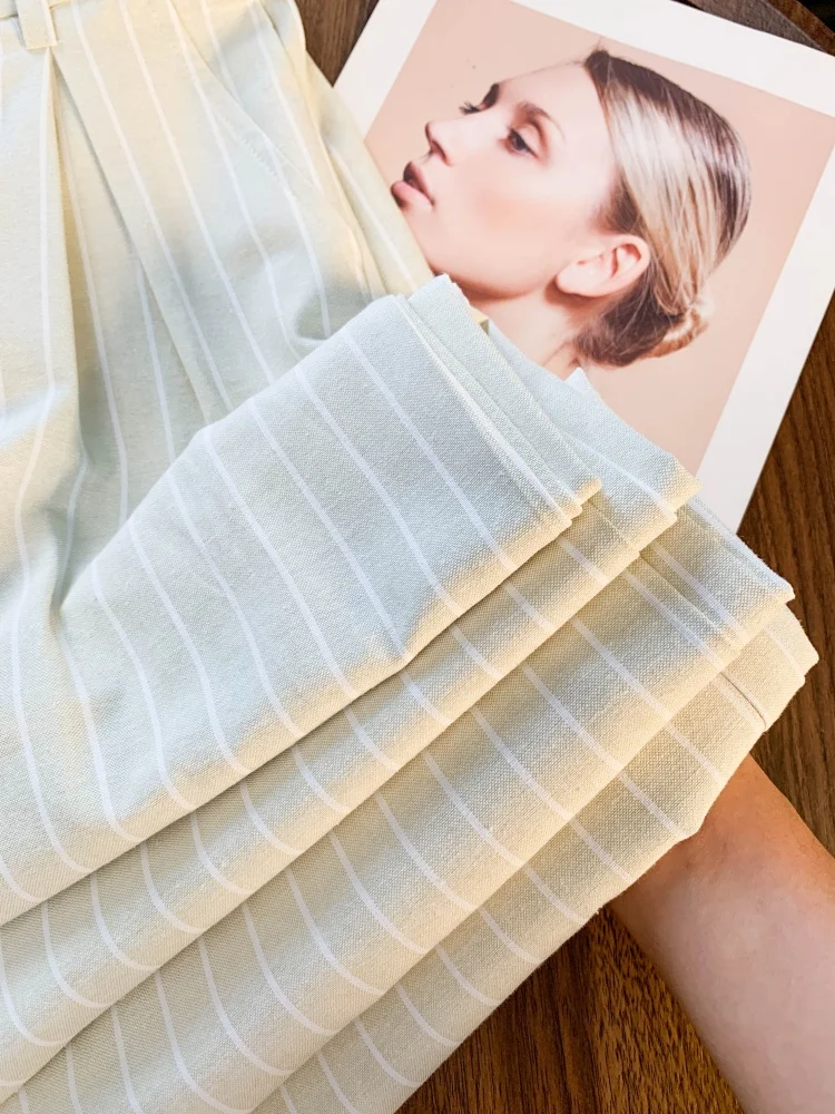 Dames abrikoos gestreepte elastische taille wijde pijpen broek Y2k Koreaanse geavanceerde gevoel gedrapeerde rechte pijpen casual kantoormeisjesbroek