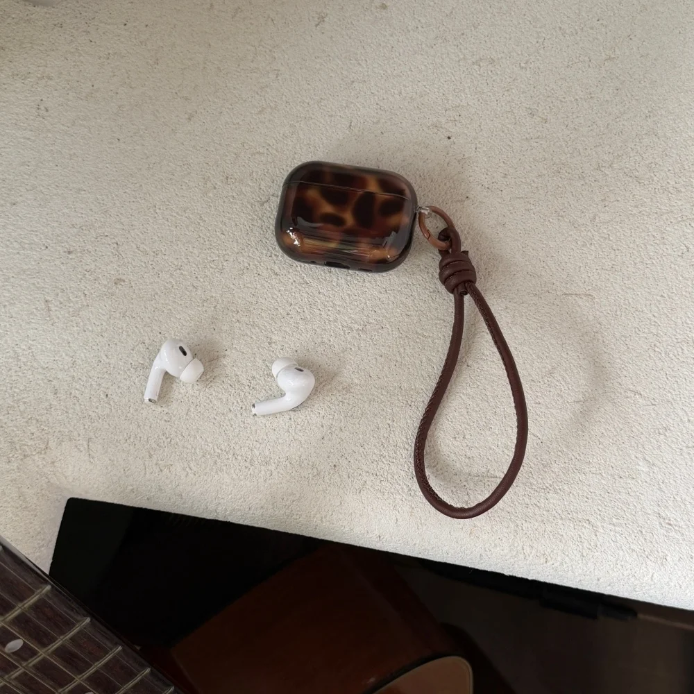 

Autumn and winter amber pattern headphone protective case, suitable for AirPods 4/3/2 Pro/2/4, new shockproof protective case