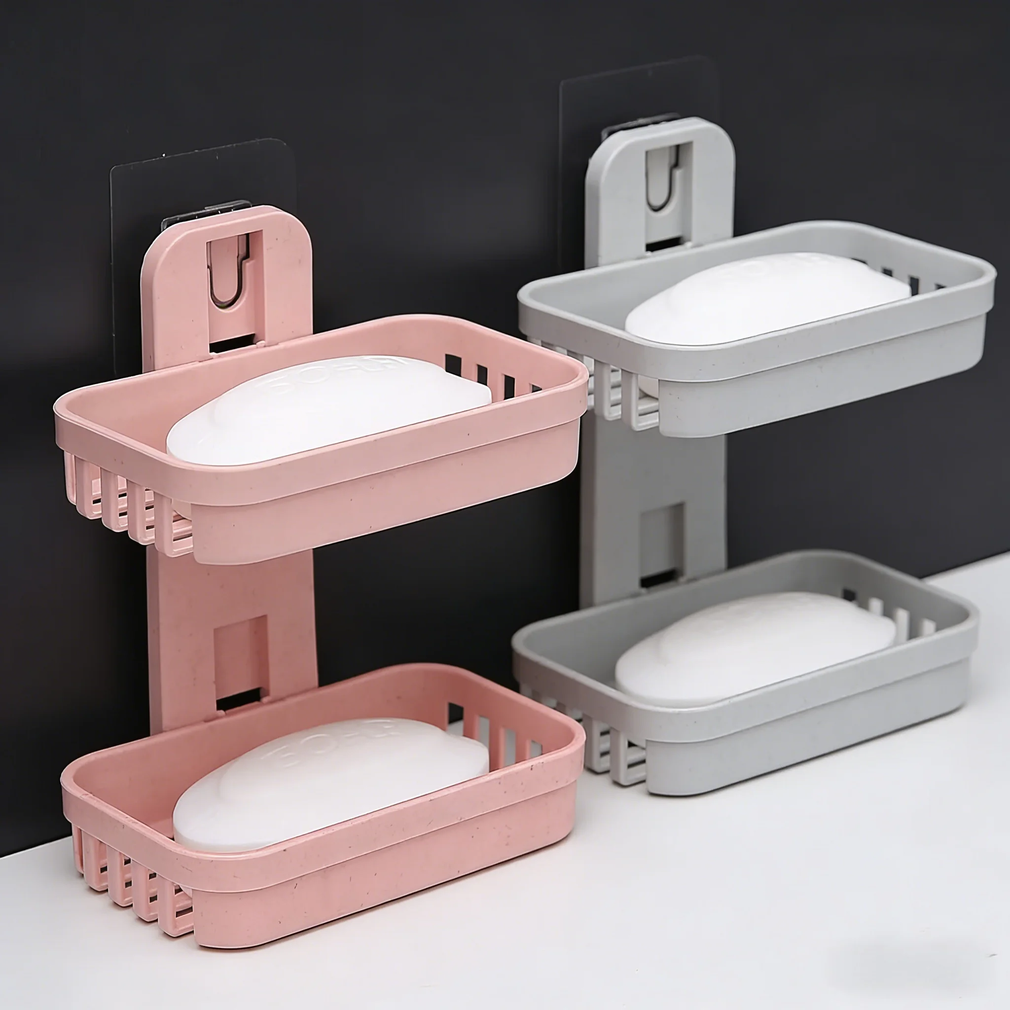 

Двухъярусная подставка для мыла розового и кремового цвета: прочная пластиковая конструкция, наклонные щели предотвращают накопление воды в ванной комнате