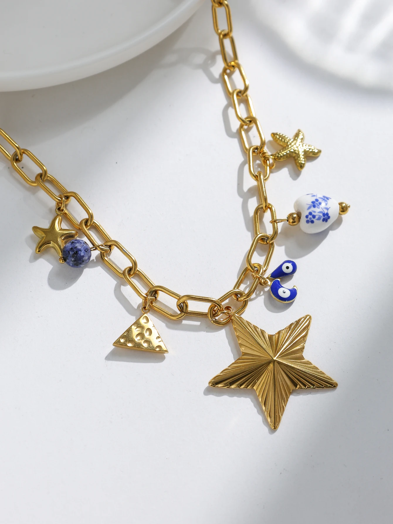 قلادة نسائية على شكل نجمة نجم البحر باللونين الأزرق والأبيض من البورسلين وعيون سلسلة المحيط من الفولاذ المقاوم للصدأ مقاومة للماء فريدة من نوعها #2