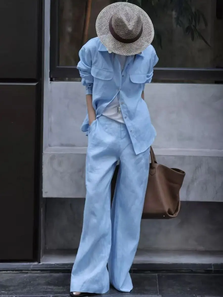 Terno de calças de linho puro feminino mínimo no início do outono