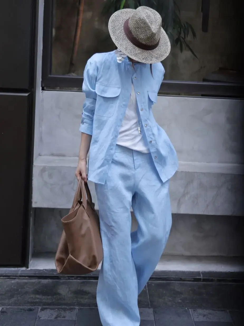 Terno de calças de linho puro feminino mínimo no início do outono